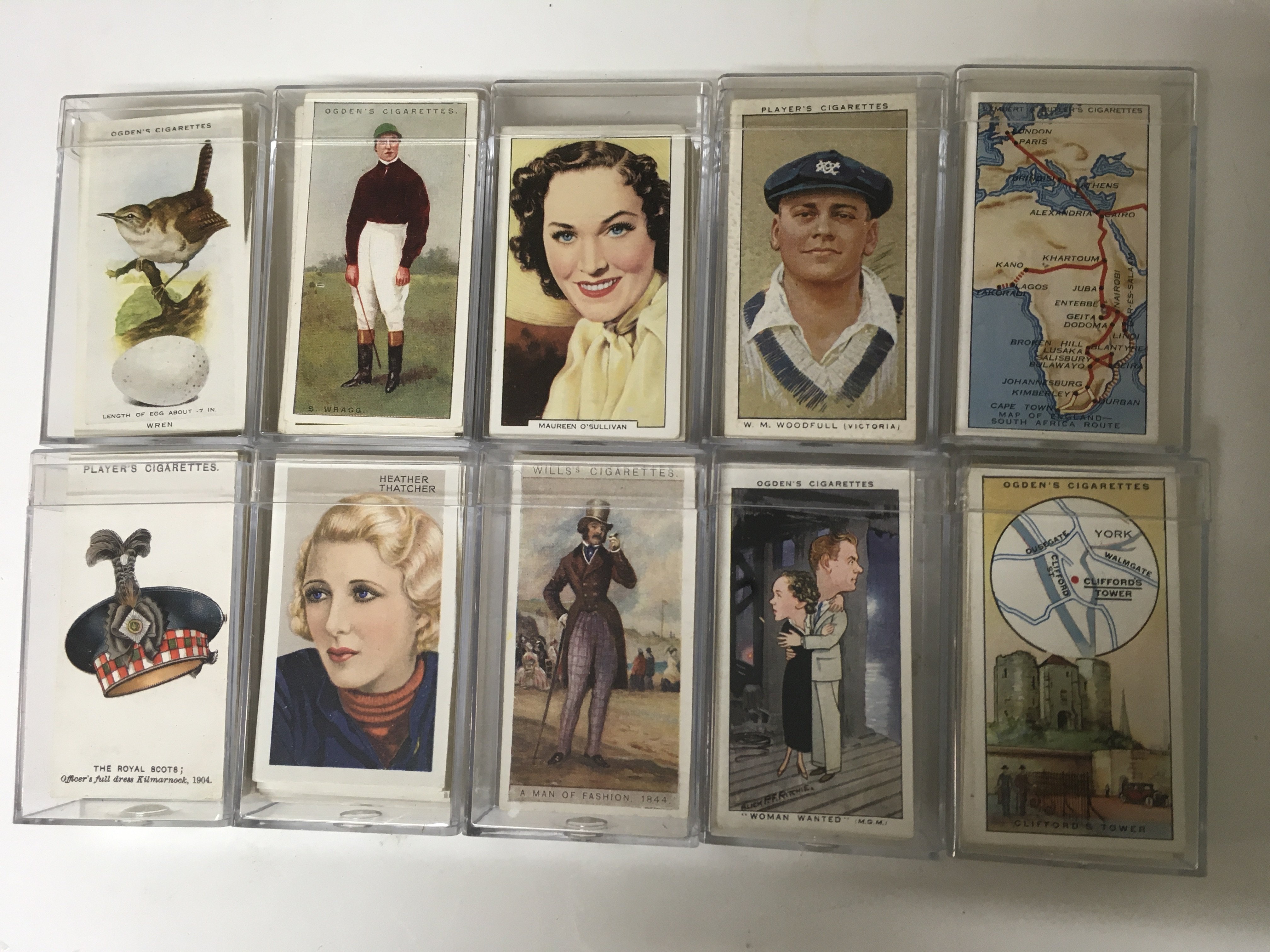 A collection of 10 sets of cigarette cards