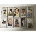 A collection of 10 sets of cigarette cards