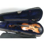 A used 19th Century German violin, Strad copy plus a case and bow together with a 3/4 size Chinese