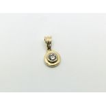 An 18ct gold diamond pendant, approx .20ct and app