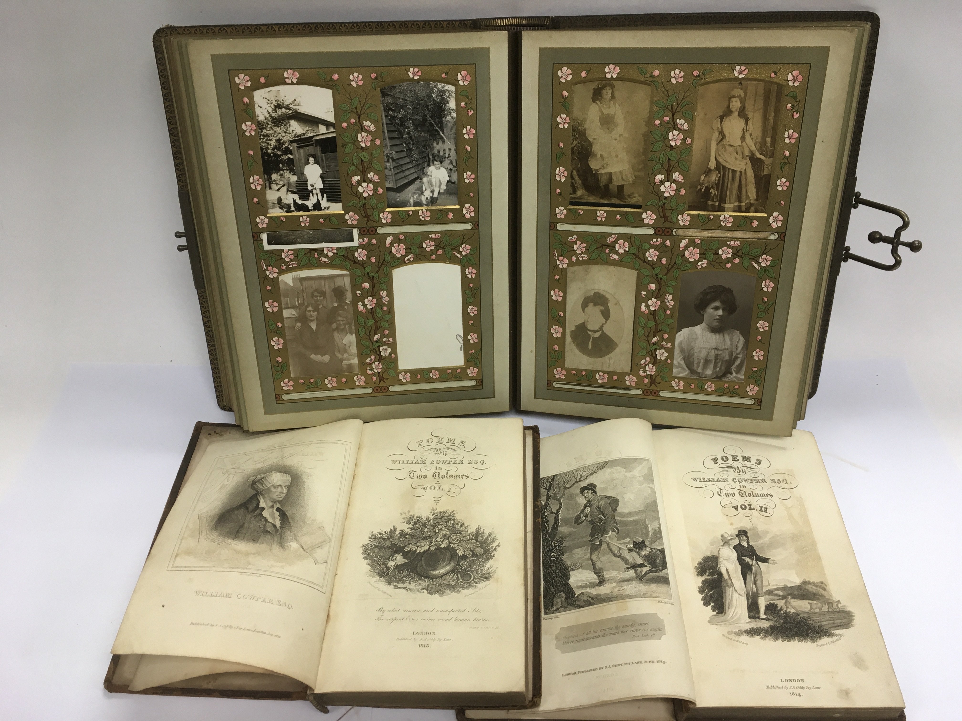 A Victorian album of photographs together with two leather bound books of poems (3).