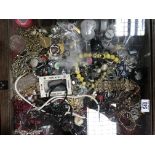A large display case and collection of costume jewellery.