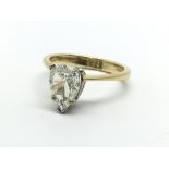 An 18ct gold ring set with pear shaped solitaire d