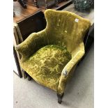 A Victorian green upholstered armchair - NO RESERV
