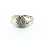 A 9ct gold diamond cluster ring in the form of a f