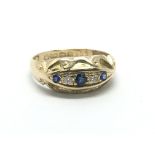 A vintage 18ct yellow gold sapphire and diamond ri