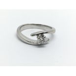 An 18ct white gold solitaire diamond ring, approx.