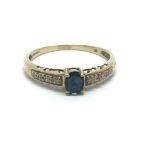 A 9ct gold sapphire and diamond ring, approx 1.8g and approx size R.