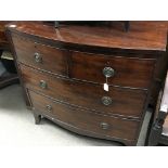 A late George lll mahogany bow fronted chest of drawers with two short and two long drawers 90cm