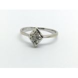 An 18ct white gold four stone diamond ring, approx