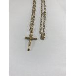 A 9 ct gold necklace with attached cross. 4 grams.