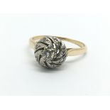 An 18ct gold diamond swirl ring, approx.15ct, appr