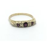 A vintage 18ct yellow gold ruby and diamond ring,