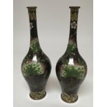 A pair of quality cloisonné vases decorated with foliage on a pattern ground no damage height 23cm