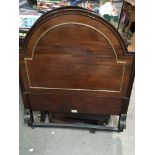 Two matching mahogany single bed heads with matching foot boards and side irons maker Heal & Son