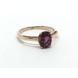 A 9ct rose gold pink sapphire solitaire ring, appr