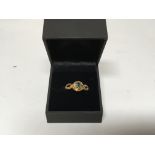 A 9carat gold ring inset with green tourmaline type stone Size N.