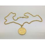 A 1912 gold sovereign on chain, approx 15.5g.