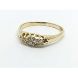 A vintage 18ct gold six stone diamond ring, approx