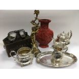 A collection of items including a gilt figural can