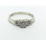 A 9ct white gold and diamond solitaire ring, appro
