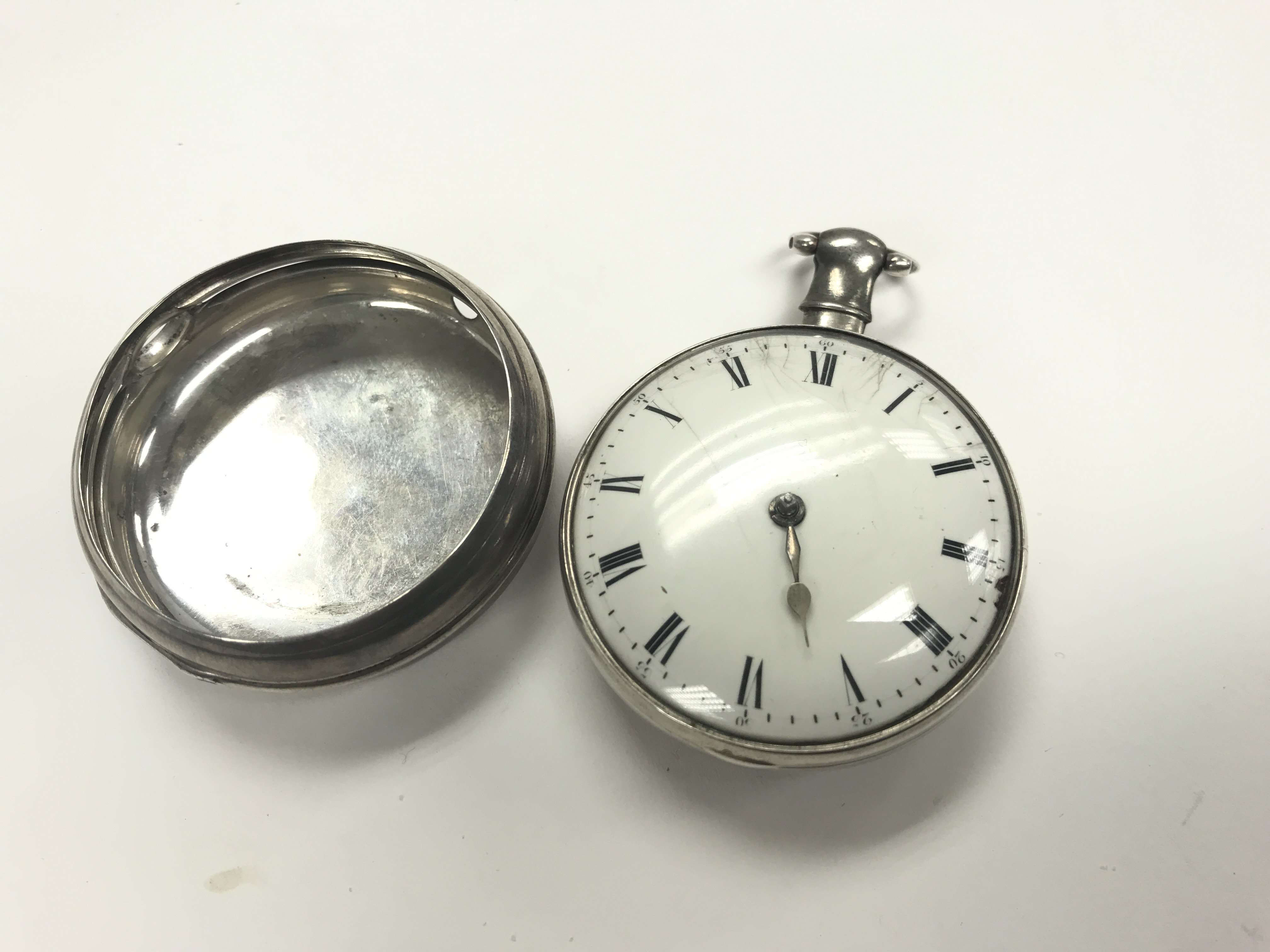 An early silver pair cased pocket watch by R.Roske