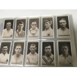 An album of cigarette card sets including Ogdens, Wills, John Sinclair, Lambert & Butler, RJ Lea,