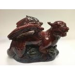 A Royal Doulton flambe ware dragon, approx height