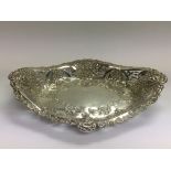 A silver bread basket with lion's head motifs, Birmingham hallmarks. Approx 268g.