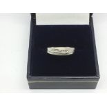 A 9ct white gold and diamond ring, approx 1.3g and approx size N.