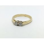 An 18ct gold two stone diamond ring, approx 1/4ct,