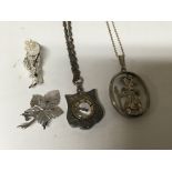 A silver pendent inset with a compass Chester hallmarks and other silver jewellery.