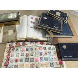A large collection of stamps and stamp albums