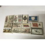 A collection of 14 sets of cigarette cards including Aircraft by Thomas Bear and Town arms by