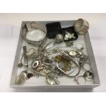 A box of silver and other items.