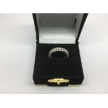 An 18ct white gold eternity ring, approx 2.8g and