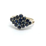 A gold sapphire cluster ring, approx 2.8g and appr