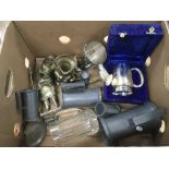 A box of various metalware items comprising pewter tankards, brassware etc.