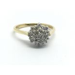 An 18ct gold diamond cluster ring, approx 3.2g and