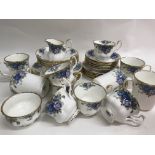 A Royal Albert tea and dinner set including coffee pot, tea pot, dinner plates, milk jug etc