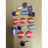 A small collection of Butlins badges and school badges.
