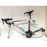 A Bianchi 928 Super Leggera carbon fibre racing bike frame with Shimano Ultegra gears and