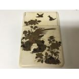 A late 19th century ivory card case with applied lacquer decoration. 11x7cm