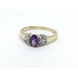 A 9ct gold amethyst and small diamond ring, approx