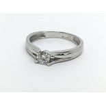 An 18ct white gold solitaire diamond ring, approx.