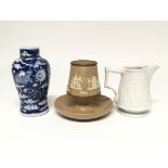 Three ceramic items consisting of a Doulton Lambeth stoneware match striker, a small Chinese vase
