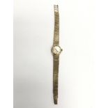 A ladies 9ct gold Omega watch.