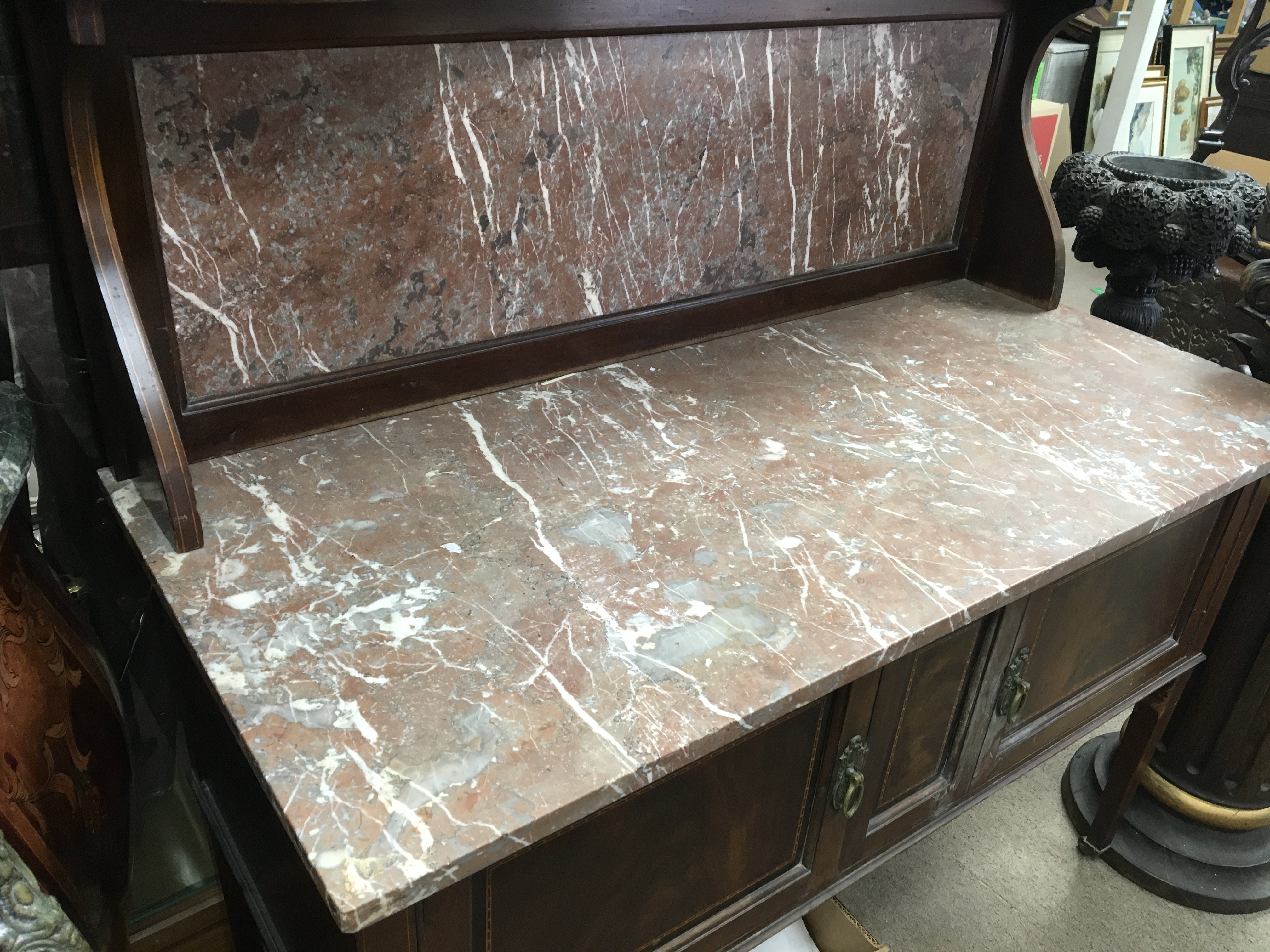 A Edwardian inlaid marble top wash stand with cupb