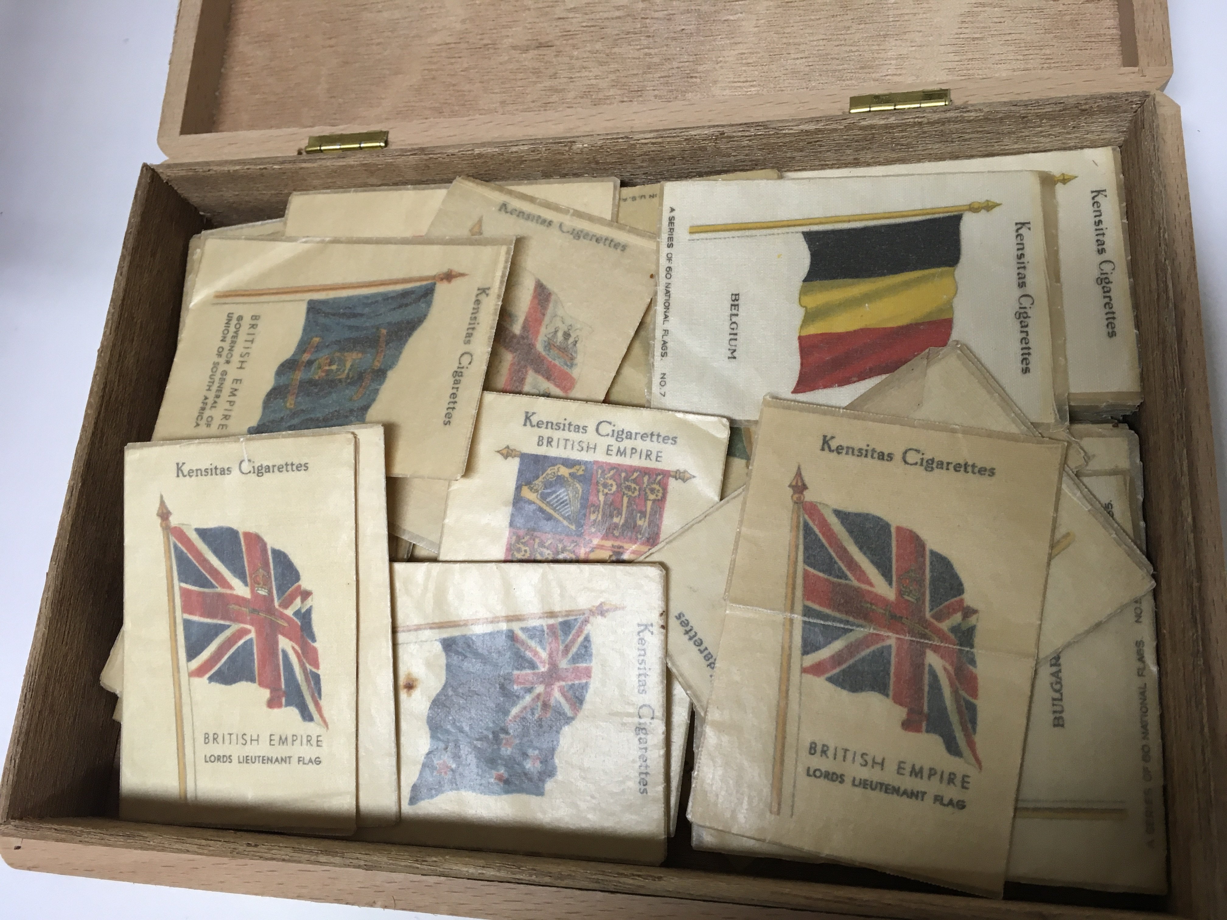 A collection of loose Kensitas silk cigarette cards ( Flags ) all in original wax wrappers