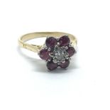 An 18ct yellow gold and ruby and diamond cluster r